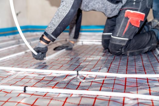 installation of underfloor heating in a new building.