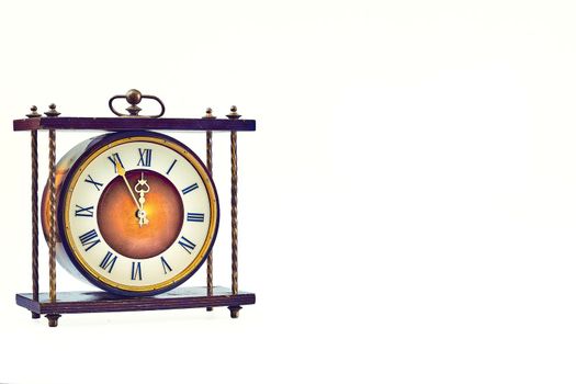 a mechanical or electrical device for measuring time, indicating hours, minutes, and sometimes seconds, typically by hands on a round dial or by displayed figures.