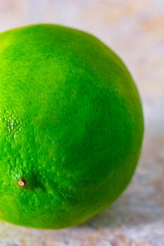 Green ripe lime lime citrus fruit on the table in Playa del Carmen Quintana Roo Mexico.