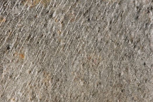 Samples of gray stone with a wavy pattern for the interior. Texture of natural stone. Natural stone surface for flooring or wall decoration