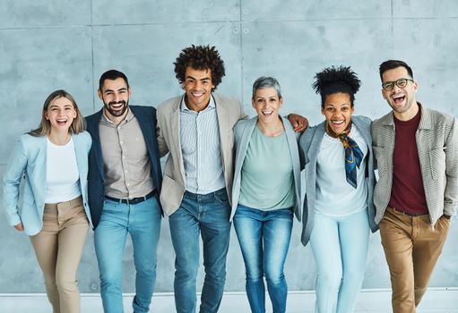 group of young business people team walking toghether and holding each other in the office