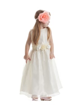 Little girl in long dress. Isolated on white