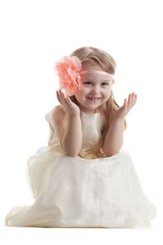 Funny little girl in long dress. Isolated on white