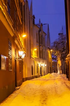 Illuminated street in the city. Christmas decorations in the old town Riga, Latvia.