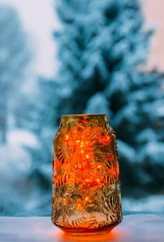 Christmas garland lights. Winter home decor. Blurred bokeh festive background.