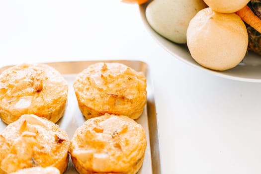 breakfast with with mini apple pies and fresh fruits. typical Italian breakfast