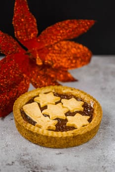 Cranberry jam tart. Top view, vintage tone. A sweet and fragrant rediscover the Christmas traditions. Copy space.