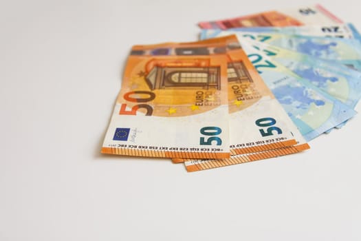 Euro money banknotes on a light background close up.
