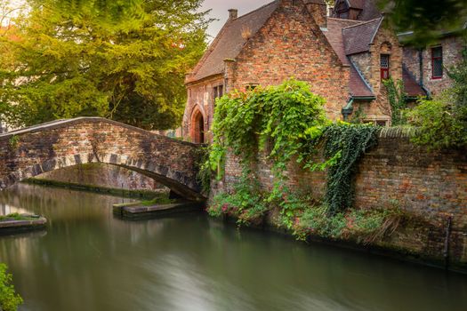 Flemish and ornate architecture of Bruges with canal and bridge, Flanders, Belgium