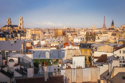 Saint-Germain-des-Pres and french roofs architecture from above at sunrise from quartier latin, Paris, France