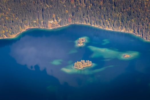 Eibsee lake from above Zugspitze at dramatic autumn landscape, Garmisch, Germany, border with Austria Tyrol