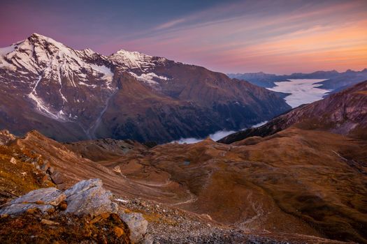 Hohe Tauern mountain range from above dramatic Grossglockner road at sunrise, Austria