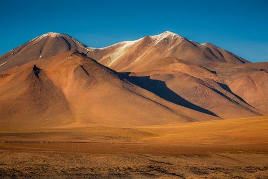 Atacama Desert dramatic volcanic landscape at Sunset, Northern Chile, South America