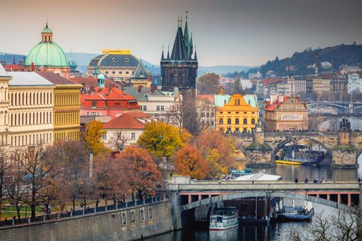 Panoramic view over the cityscape of Prague and Vltava river at dramatic sunset, Czech Republic