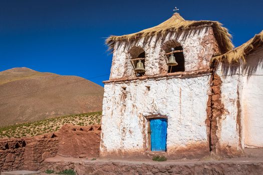Chapel in El Tatio Machuca in Atacama desert altiplano at sunny day, Chile, South America