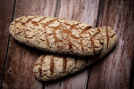 Rye bread on brown background. High quality photo