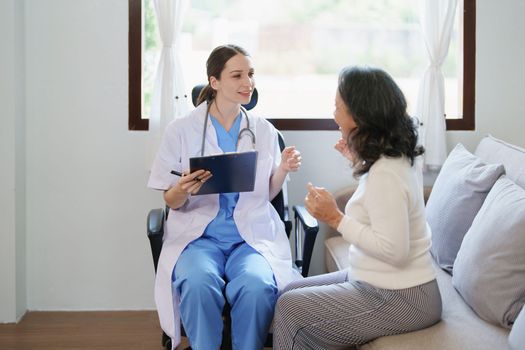 Portrait of a female doctor holding a patient clipboard to discuss and analyze the patient's condition before treating