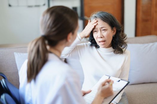 Portrait of a female doctor holding a patient clipboard to discuss and analyze the patient's condition before treating