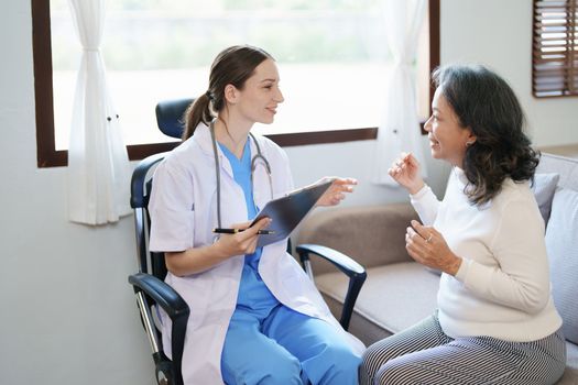 Portrait of a female doctor holding a patient clipboard to discuss and analyze the patient's condition before treating