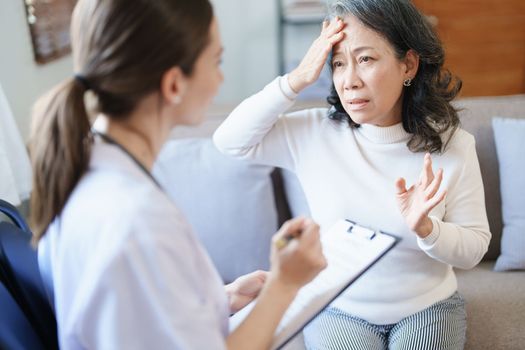 Portrait of a female doctor holding a patient clipboard to discuss and analyze the patient's condition before treating