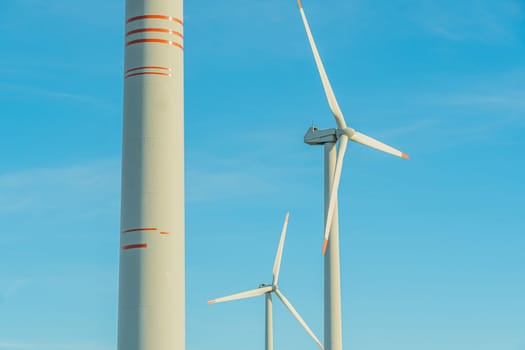 Green energy on wind turbines and wind turbines. Alternative energy sources and renewable energy sources. Power generation and generators of power plants.Wind farm and wind,environmental conservation