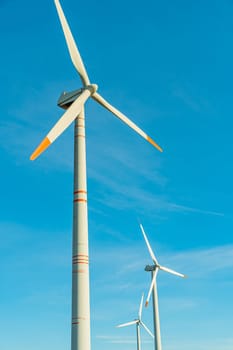 Green energy on wind turbines and wind turbines. Alternative energy sources and renewable energy sources. Power generation and generators of power plants.Wind farm and wind,environmental conservation