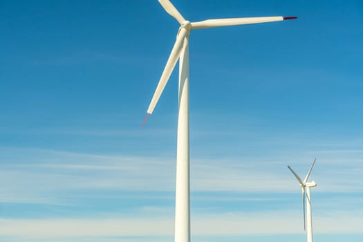 Green energy on wind turbines and wind turbines. Alternative energy sources and renewable energy sources. Power generation and generators of power plants.Wind farm and wind,environmental conservation