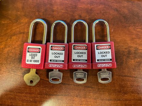 Red Lock out tag out locks locks . High quality photo