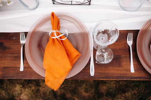 Dishes on the wedding table, decor of the dining table for the holiday.