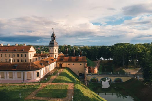 Beautiful golden sunrise near the Palace in Nesvizh, Minsk region, Belarus.