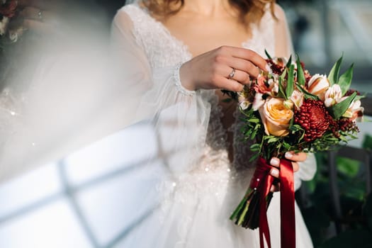 wedding bouquet in the hands of the bride.The decor at the wedding.