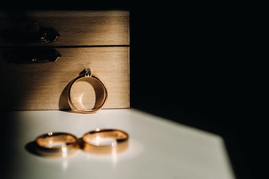 Close-up of two gold wedding rings for a wedding.