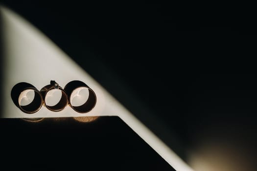 Close-up of two gold wedding rings for a wedding.