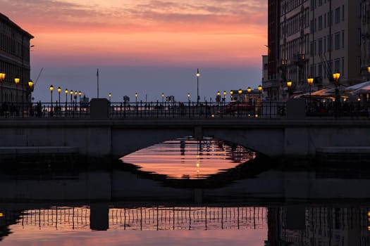 View of Ponte rosso in Trieste at sunset, Italy