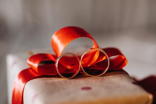 Close-up of two gold wedding rings for a wedding.