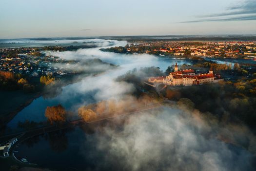 Nesvizh castle is a residential castle of the Radziwill family in Nesvizh, Belarus, with a beautiful view from above at dawn.