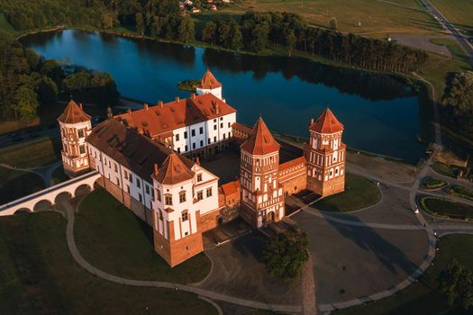 Mir castle with spires near the lake top view in Belarus near the city of Mir.