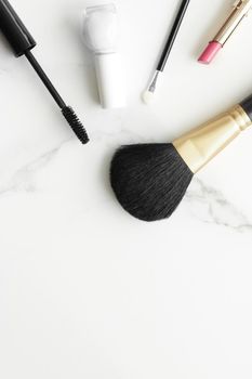 Make-up and cosmetics products on marble, flatlay background - modern feminine lifestyle, beauty blog and fashion inspiration concept