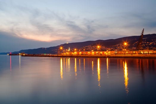 View of the Trieste coast at sunset