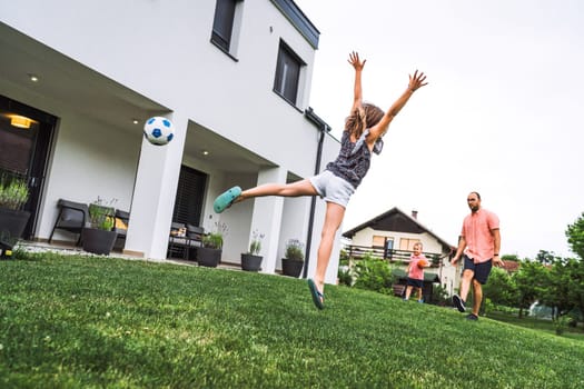 Happy caucasian family of four, mother father and children at home, outdoors playing on the grass, and indoors in the living room having fun as a family.