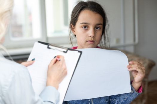 Cute little girl at child psychologist's office