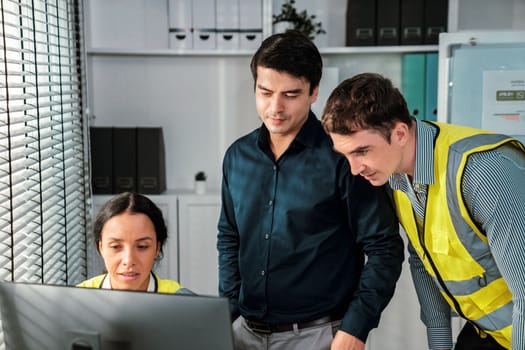 Competent engineers create blueprints and plans and present them to their boss. Architectural investors working with engineers for engineering project.