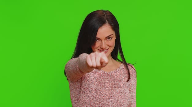 Angry aggressive pretty woman showing fig negative gesture, you dont get it anyway. Rapacious, avaricious, acquisitive. Body language. Refusal fig sign. Greedy avaricious girl on chroma key background