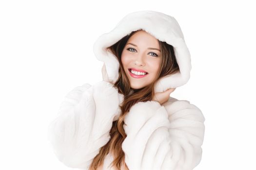 Winter fashion and beauty, beautiful woman in white fur coat.