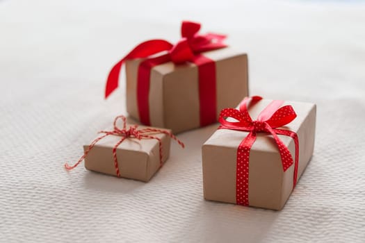 Valentines Day, birthday and holidays, gifts and presents with red ribbons.