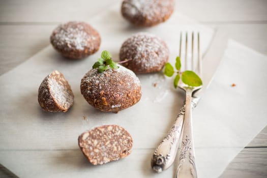 chocolate sweet cakes made from pureed cookies with additives, on baking paper.