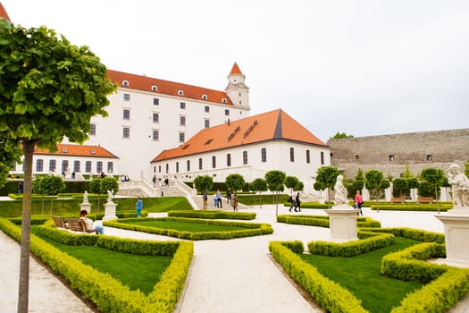 The courtyard garden of the baroque castle of Bratislava. The castle stands on an isolated rocky hill directly above the Danube River in the center of Bratislava, Slovakia