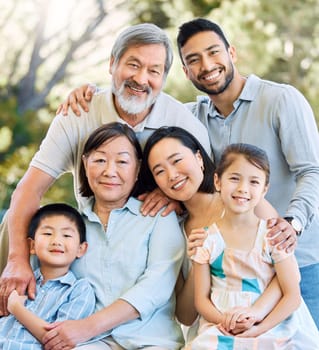 Family is the steadiest rock in the world. a happy family spending time together in a garden