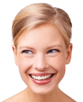 Her beaming smile puts everyone at ease. Studio shot of a gorgeous young blond woman