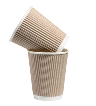 Empty brown paper disposable cups on a white background, concept eco-friendly, zero waste 